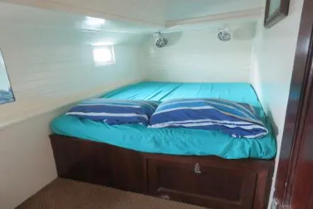 Cabin with bunks on board the Wild Card sailboat